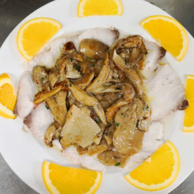 Tagliata di ricciola con porcini